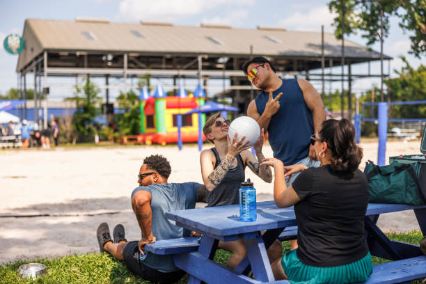istock Volleyball break: casual moments among diverse friends 2157923083