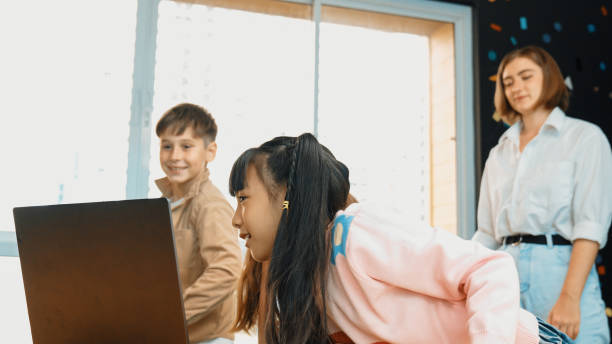 istock Young girl looking data at laptop screen while start presentation. Erudition. 2157927420