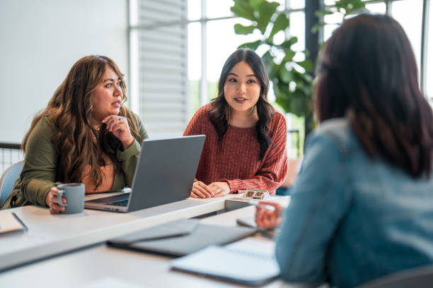 istock Diverse Female Professionals Engaged in Strategic Discussion 2157928478