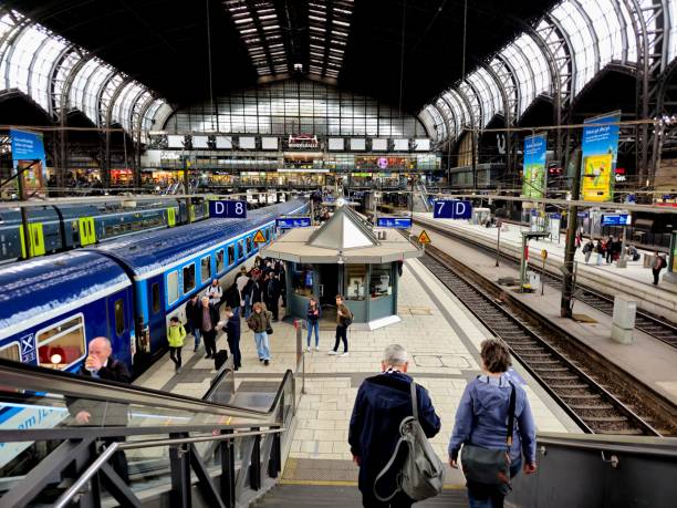 Hamburg Hauptbahnhof, or Hamburg Central Railway Station, is the main railway station of the city of Hamburg, Germany. Opened in 1906. With an average of 550,000 passengers a day, it is Germany's busiest railway station. The image shows the main hall with the platforms.