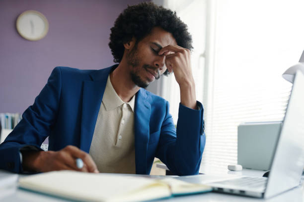 istock Businessman Suffering from Headache 2157928852