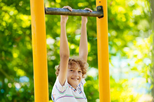 istock Child on playground. Active kid in school yard. 2157929964