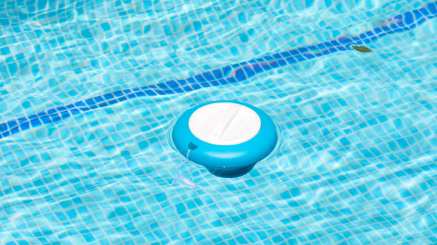 istock Pouring chlorine into the pool automatically 2157931099