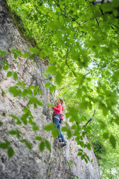 Caucasian Woman Displays Rock Climbing Prowess