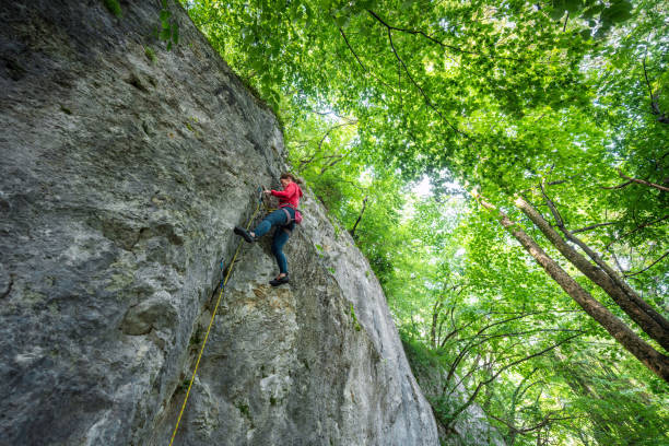 istock Caucasian Woman Conquers Climbing Challenge 2157931224