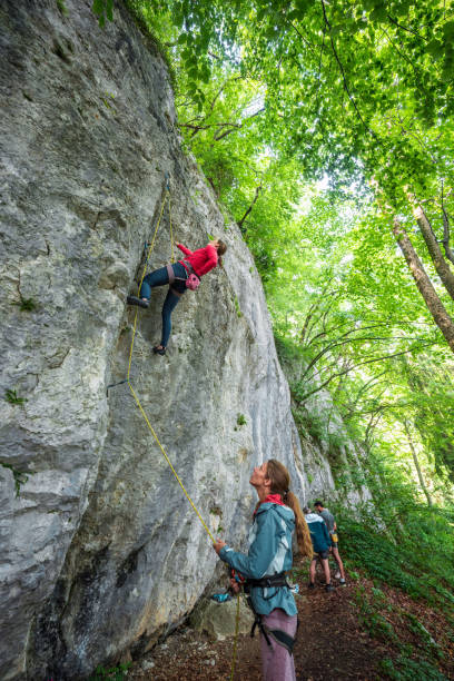 istock Climbing Duo Tackling Steep Rock Face Outdoors 2157931225