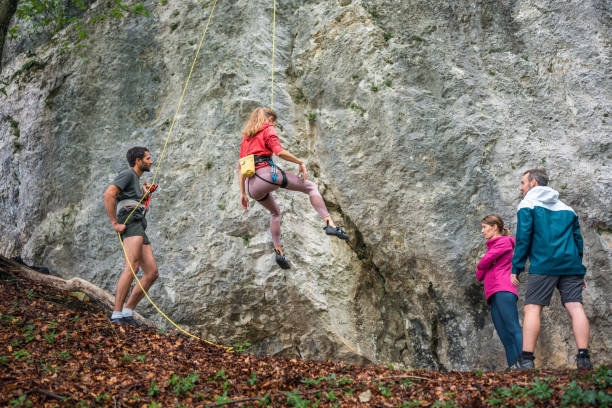 istock Rock Climbing Team Engages in Outdoor Adventure 2157931271