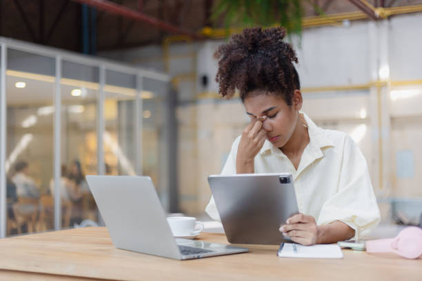 istock Young African American businesswoman stressed from work. 2157932247