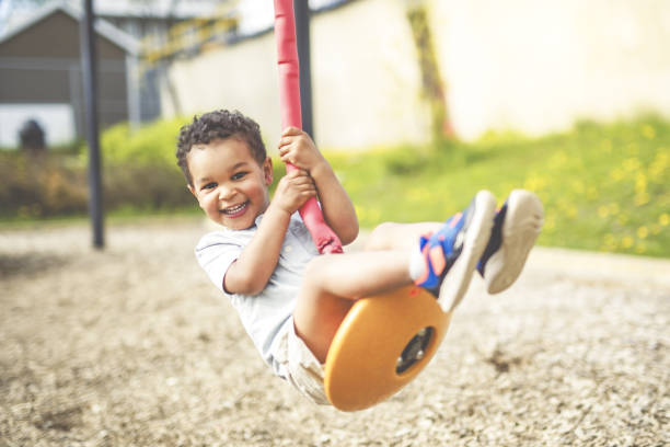 istock Happy kid on playground on summer season 2157938642