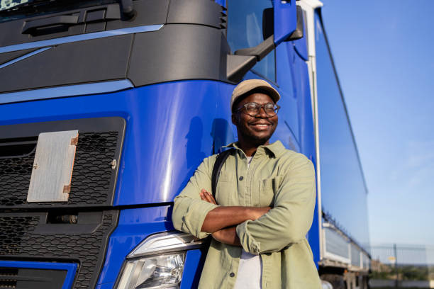 istock Truck driver proud on his job. 2157939123