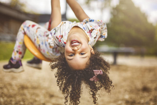 A Happy kid on playground on summer season