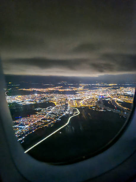 View From The Airplane Window Above Belgrade At Night