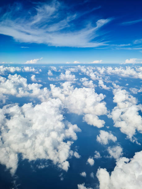 istock View Of The Clouds From The Airplane Window Mid-Air 2157945244
