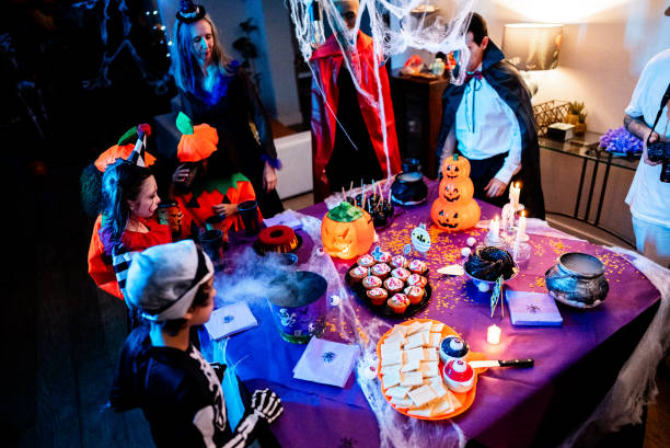 istock Friends eating on a Halloween party 2157948250