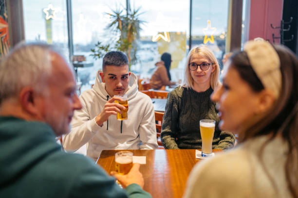 istock Small Group Of People Drinking Beer In A Pub 2157948653