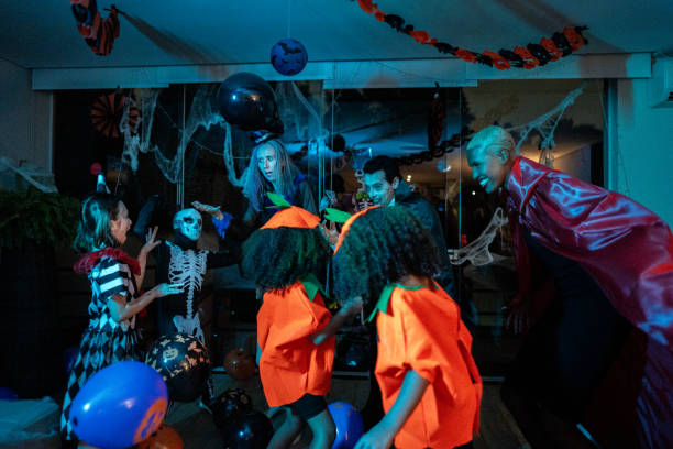 istock Friends having fun on a Halloween party 2157949381