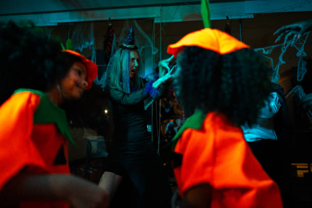 Mature women having fun on a Halloween party