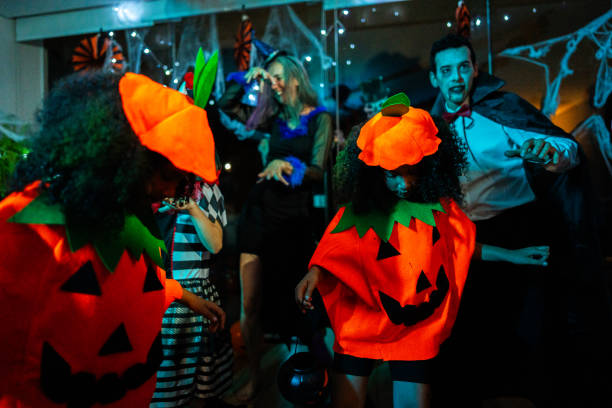 istock Friends having fun on a Halloween party 2157949430