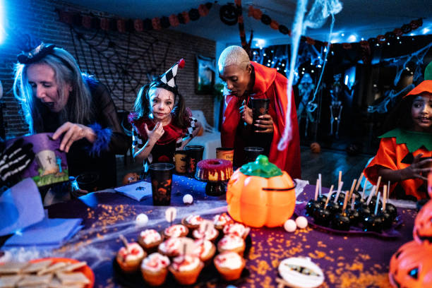 istock Friends eating on a Halloween party 2157949552