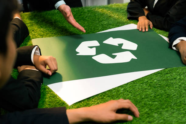istock Recycle icon on meeting table with business people. Quaint 2157949780