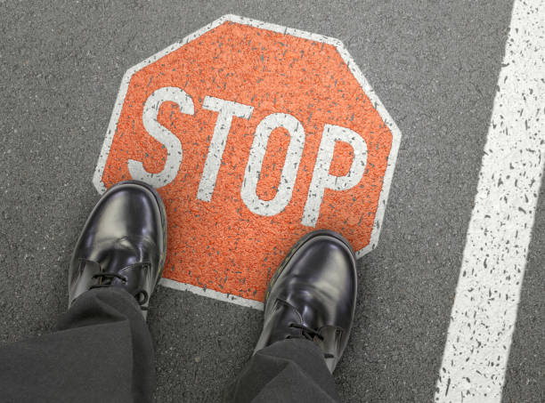 istock Stop sign on the road, Business man stopped 2157950186