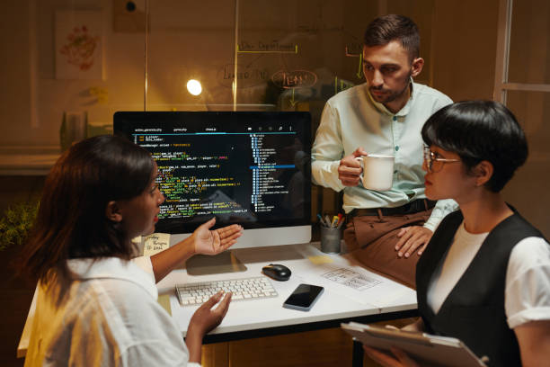 istock Team Leader Talking to Coworkers 2157951710