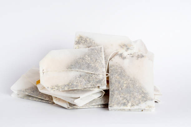 istock Several tea bags with empty labels on a white background. Template with blank tag on the theme of hot soft drinks. 2157955611