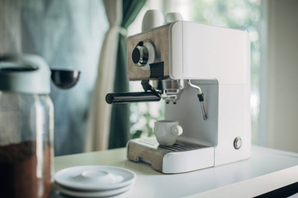 istock White coffee maker with unfiltered coffee in a glass bottle and coffee cups 2157956099