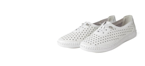 istock Comfortable White Women's Perforated Slip-On Casual Shoes for Summer 2157958568