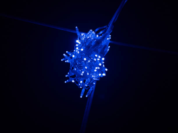 istock lamp bulb in a city at night 2157959028