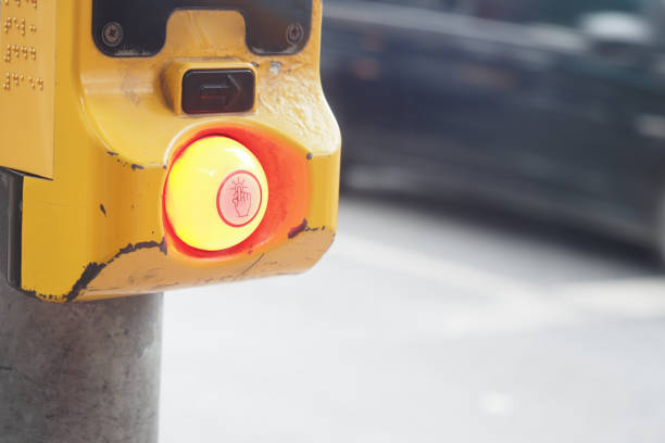 close up of crossing signal button .