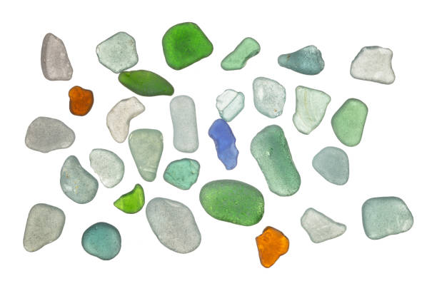 Shards of beach glass isolated on white.