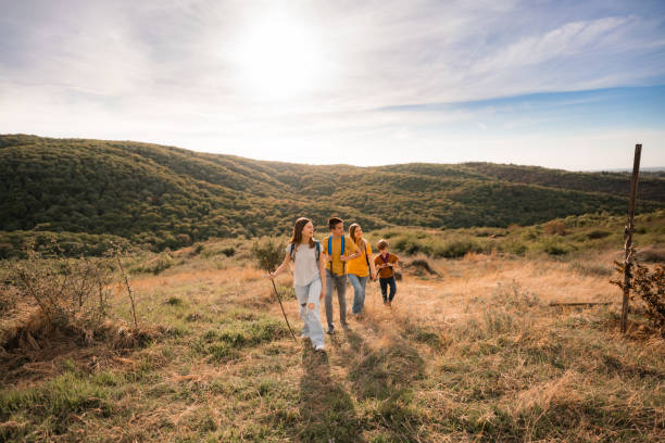 istock Group of children hiking on a mountain 2157963313