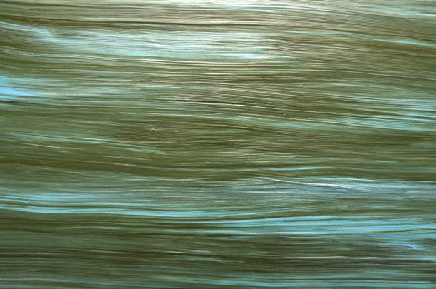 istock striped art background in olive white color 2157972191