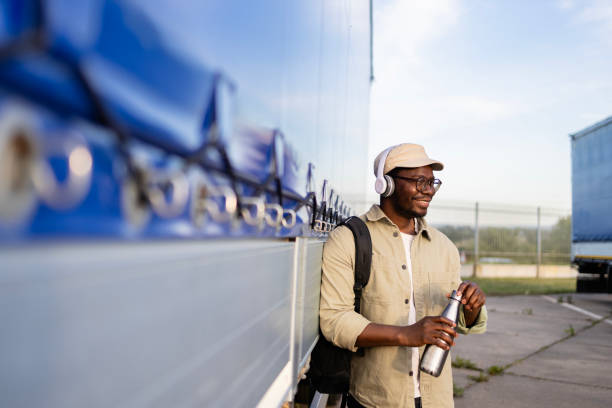 istock Truck driver loving his job. 2157973354