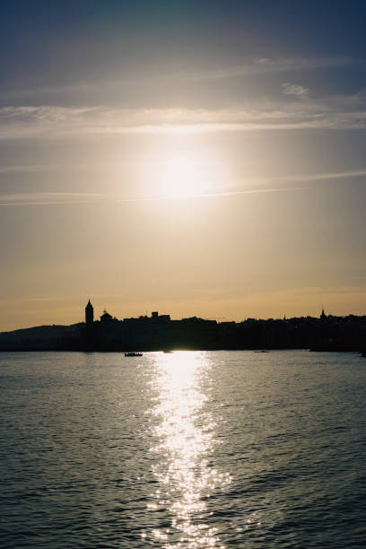 istock Sunset shining on the Mediterranean Sea in Sitges, Spain 2157988602