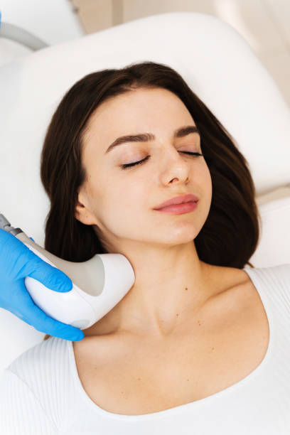 istock Hardware cosmetology procedure. Process of needle-free rf-lifting when you need to tighten your face shape without injections. 2157994399