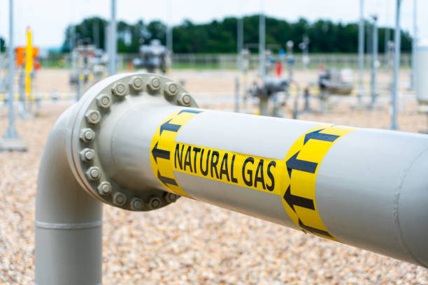 istock Gas pipeline system with high pressure and direction sign at compressor station. Concept of energy delivery infrastructure 2157996567