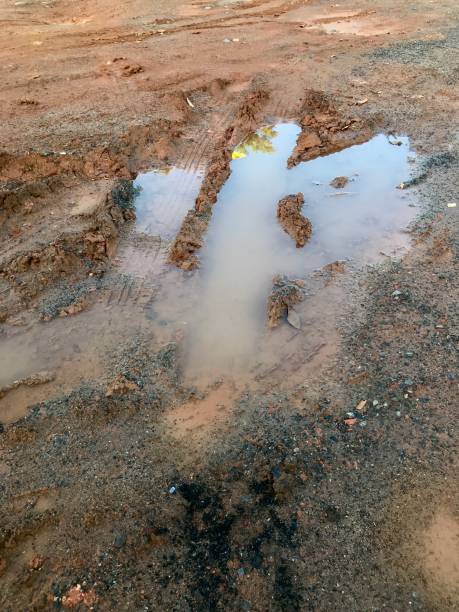 istock Mud. Mud on the floor. Wet clay. Mud Puddle. Rain water 2157999538