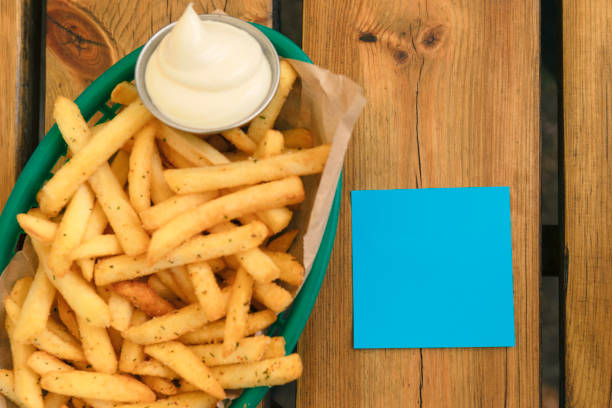 French fries isolated on white background, directly above. Close up.