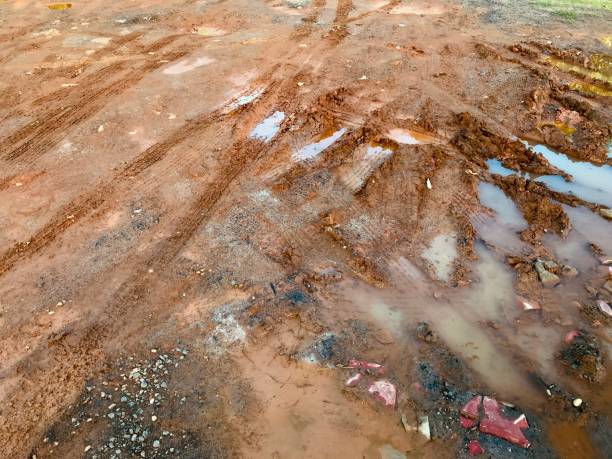 istock Mud. Mud on the floor. Wet clay. Mud Puddle. Rain water 2158000652