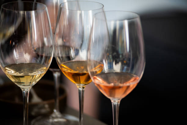 istock Wine tasting. Sommelier pours wine into a glass 2158003551