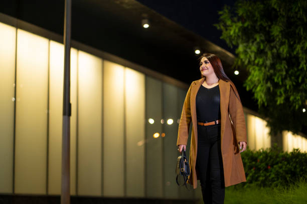 istock business woman leaving the office 2158004682