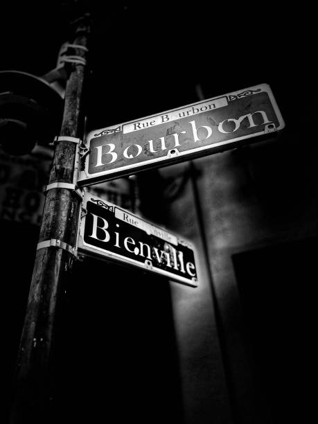 istock Low Angle View Monochromatic Image with Studio Light Effect Street Signs Bourbon and Bienville • French Quarter, New Orleans, LA, USA 2158005560