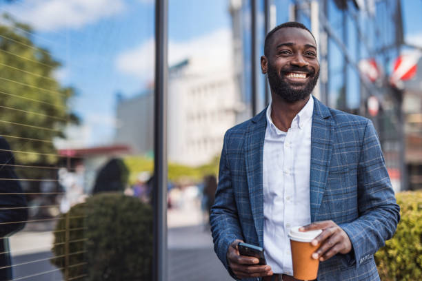 istock Grown up, a businessman, a black man next to an office building 2158010690