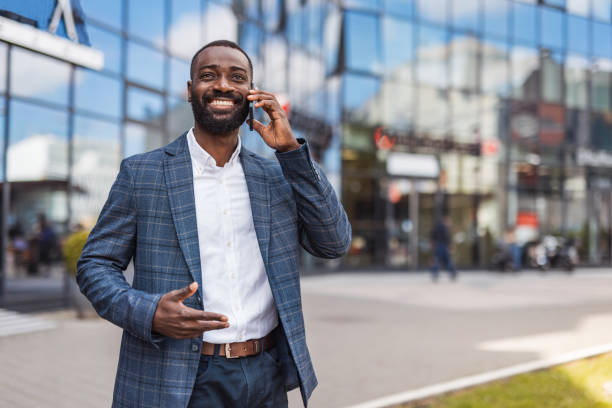 istock Grown up, a businessman, a black man next to an office building 2158010705