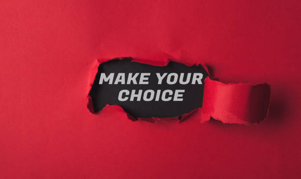 istock A red background with a black word that says Make Your Choice 2158010992