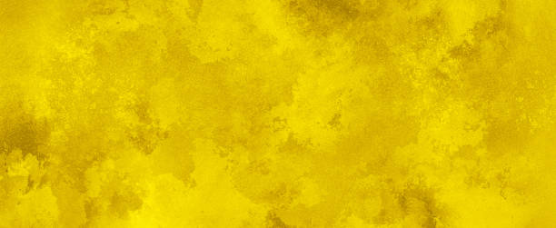 istock watercolor painting on old paper texture - yellow 2158011359