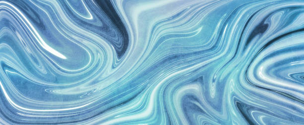 istock concept of beautiful mixed colors on blue colored water 2158011370
