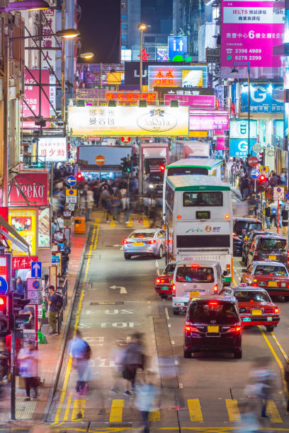 istock Hong Kong neon night rush hour traffic crowds Kowloon China 2158012784